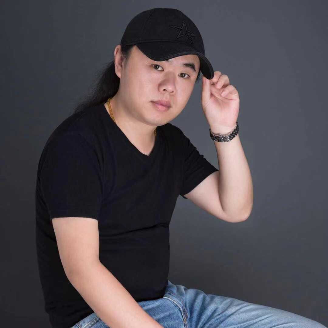 譚振興
